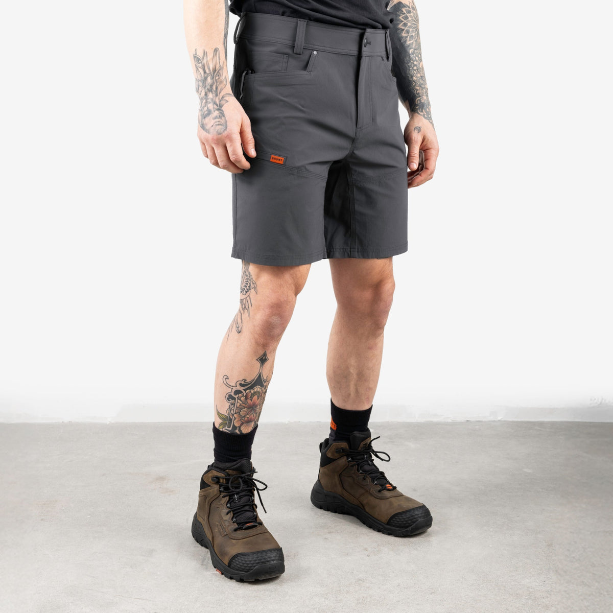 45 degree angle of front right side of BRUNT 9 inch lightweight breathable costello work shorts in charcoal