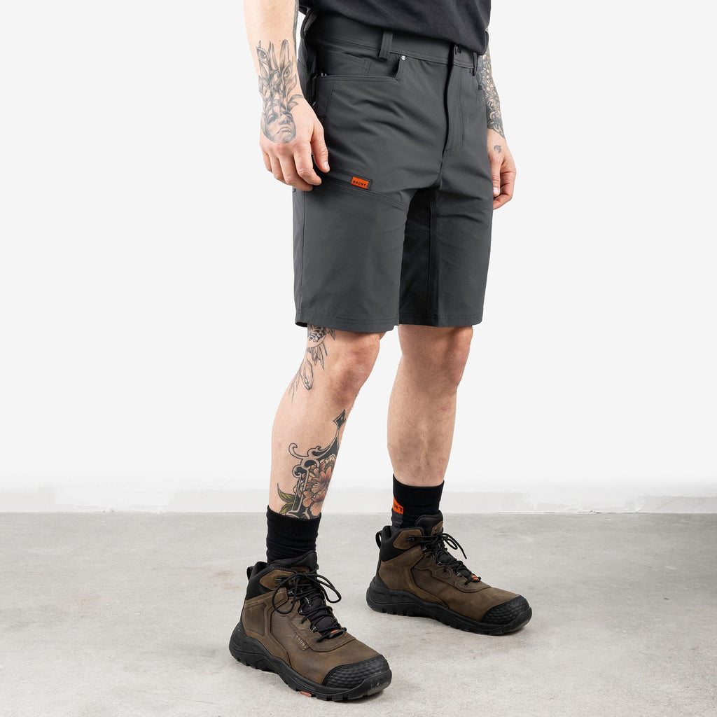 45 degree angle of front right side of BRUNT 11 inch lightweight breathable costello work shorts in charcoal