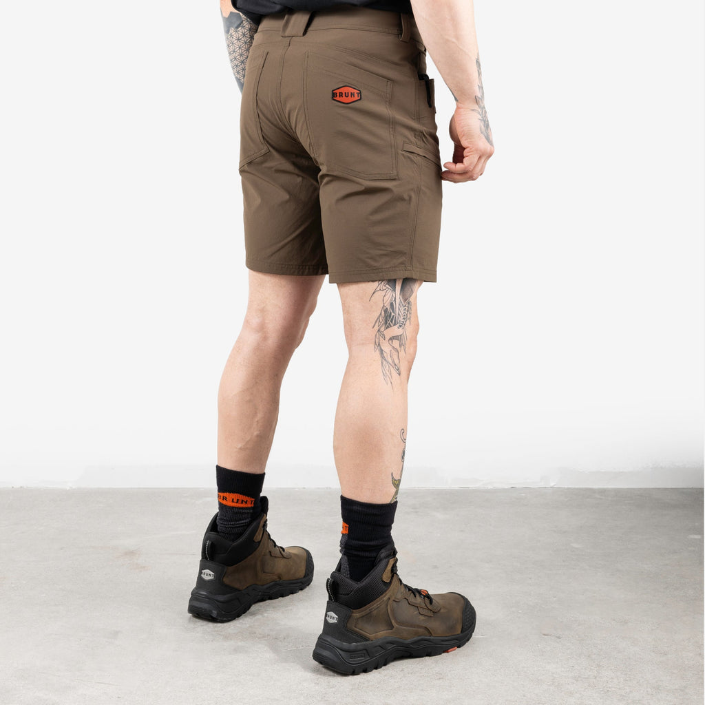45 degree angle of back right side of BRUNT 9 inch lightweight breathable costello work shorts in brown