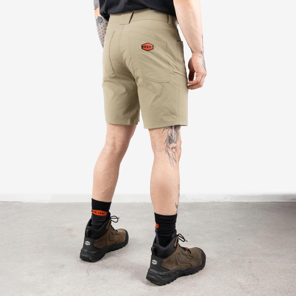 45 degree angle of back right side of BRUNT 9 inch lightweight breathable costello work shorts in khaki