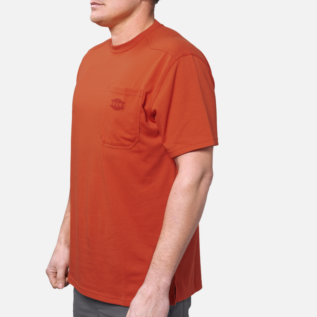 45 degree angle of the front left BRUNT high quality short sleeve pocket tee in BRUNT orange * 1