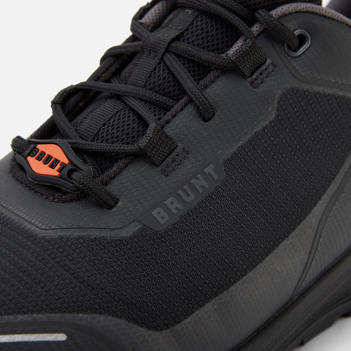 Close up details of the BRUNT 4 inch lightweight comp toe work sneaker in black * 0