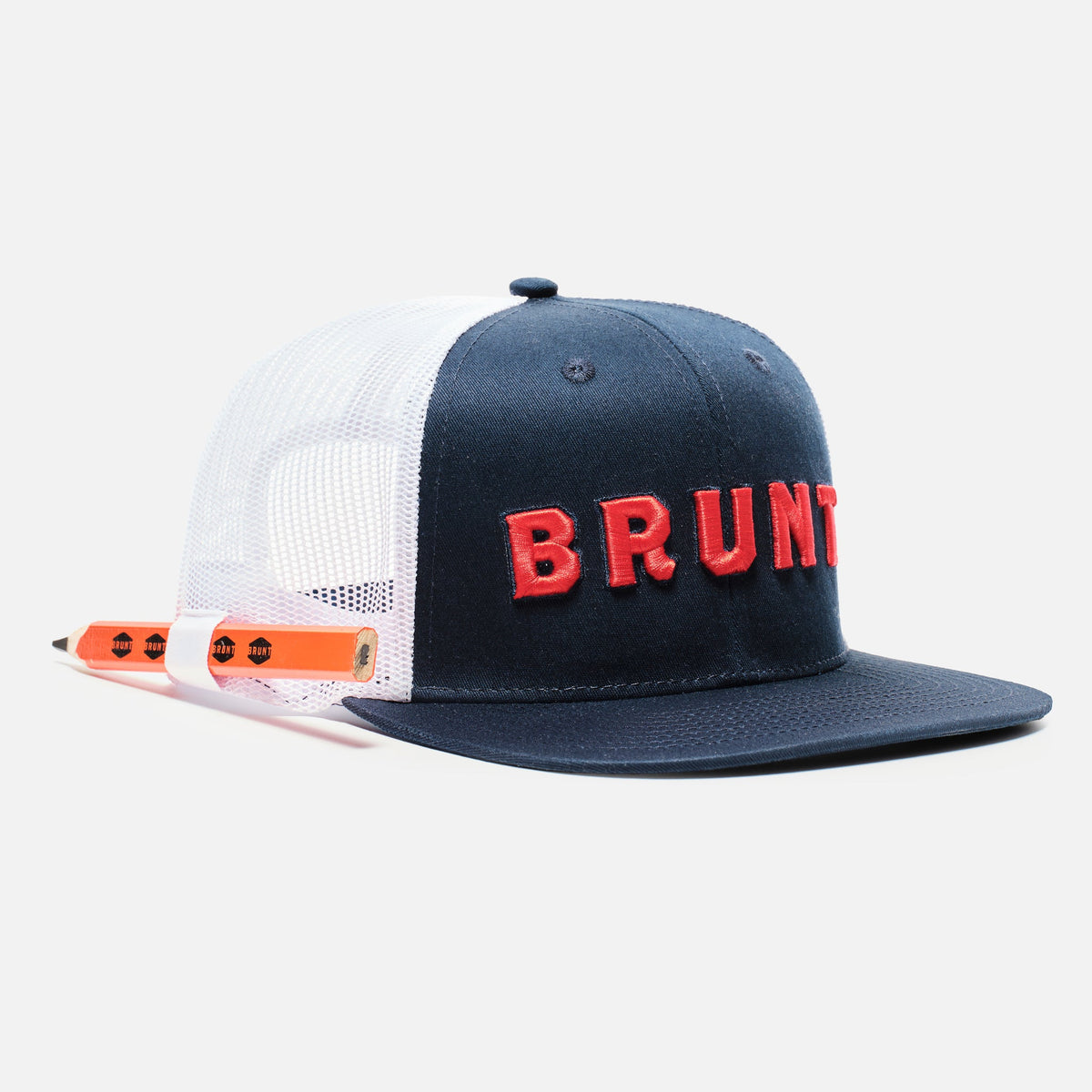 45 degree angle of front of flat brim work hat with built in pencil holder and BRUNT logo in navy blue and red