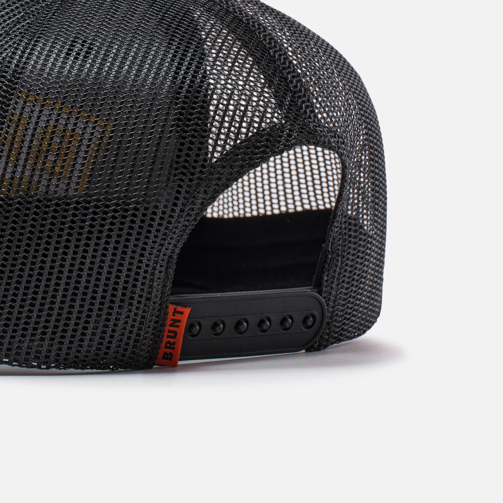 Back snaps of flat brim work hat with built in pencil holder and BRUNT logo in black and gold