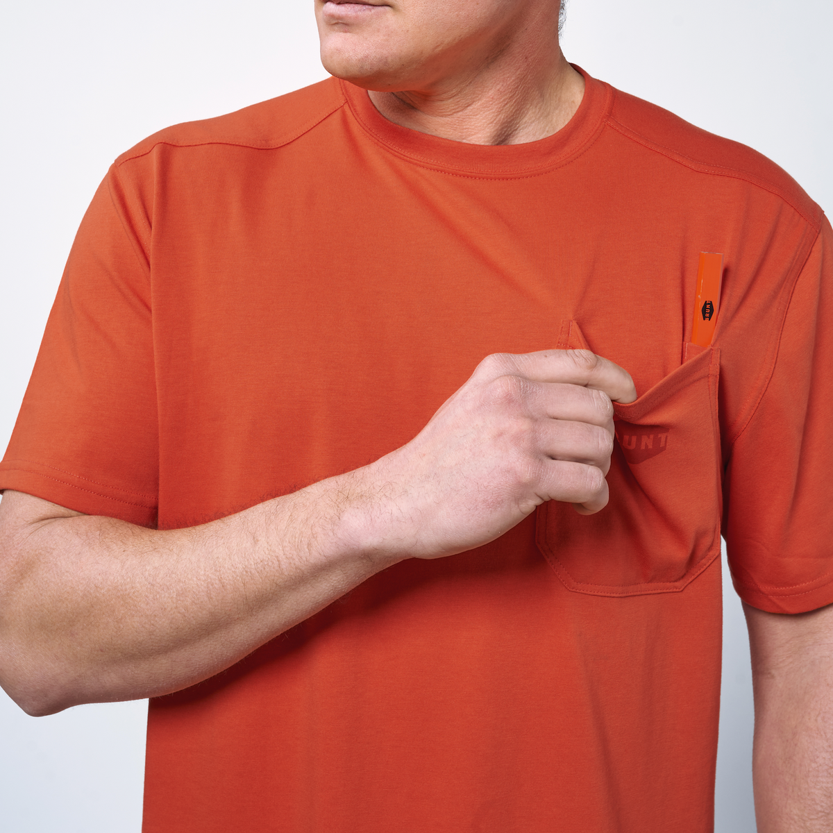 View 2 front of chest pocket with pencil slot of the BRUNT high quality short sleeve pocket tee in BRUNT orange * 1