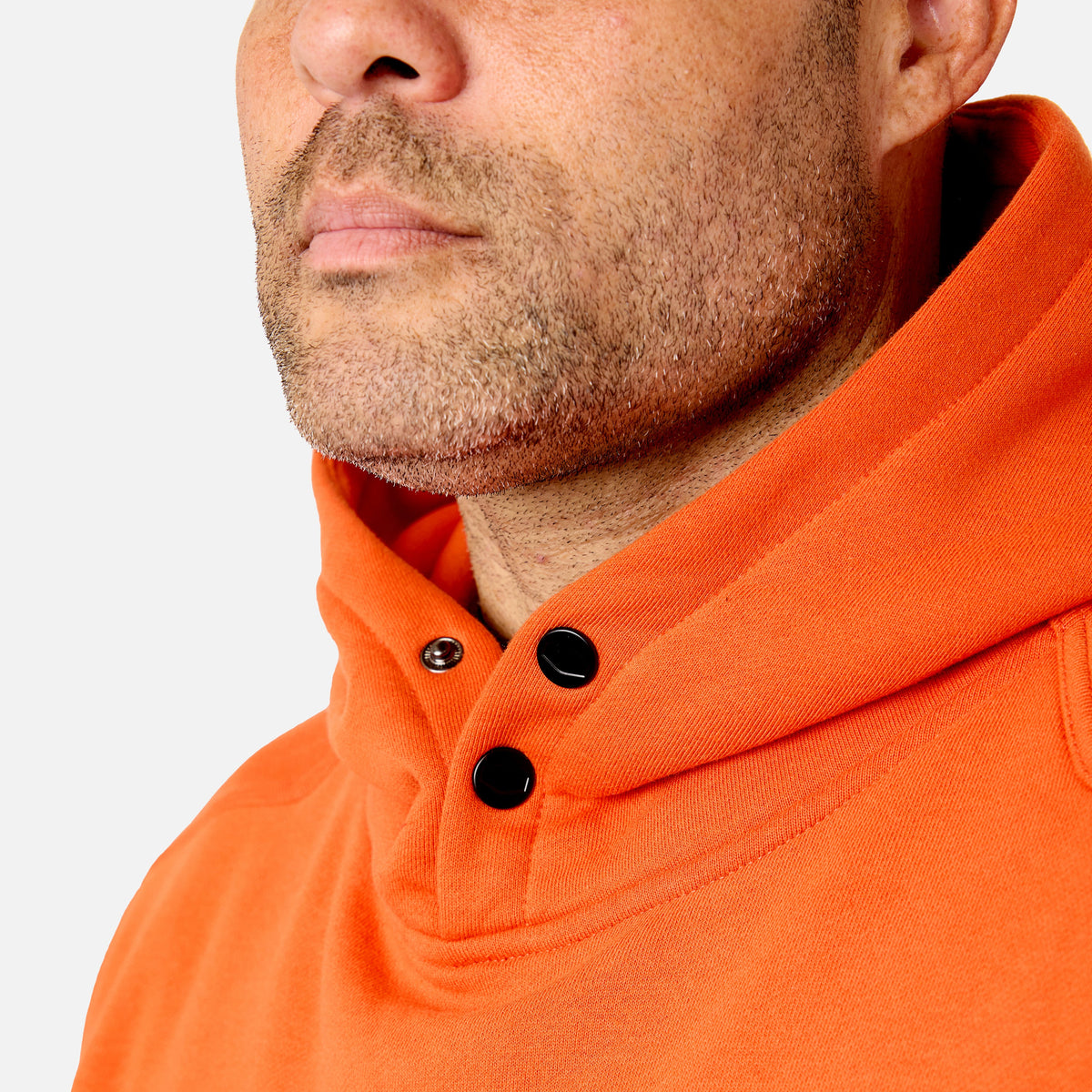 View 2 front of button snaps of the BRUNT water resistant shevlin work hoodie in BRUNT orange