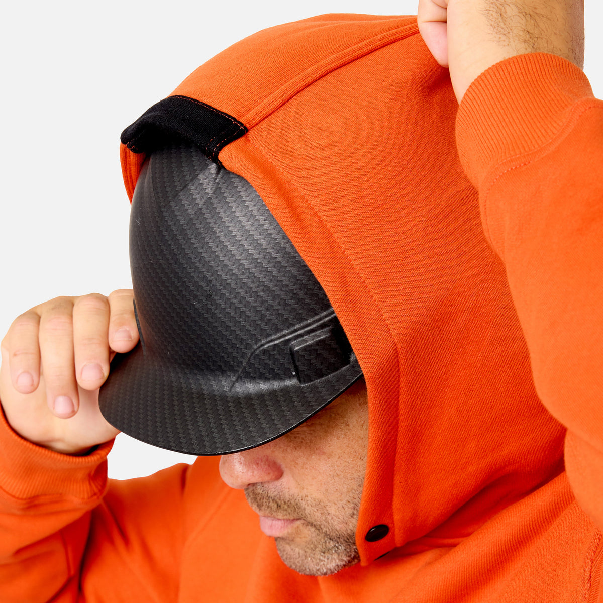 Hard hat compatible hood of the BRUNT water resistant shevlin work hoodie in BRUNT orange