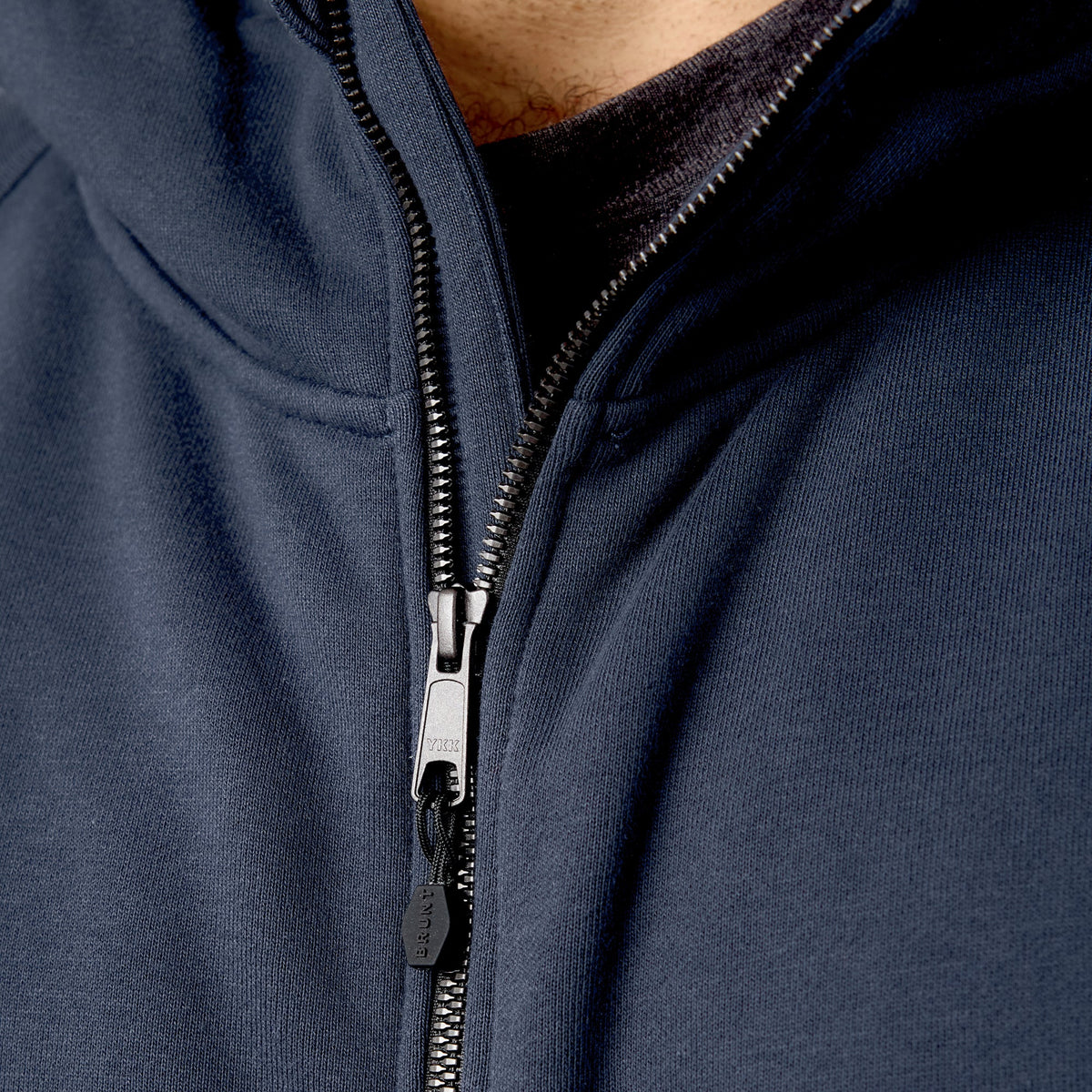 Front of the YKK metaluxe zipper of the BRUNT water resistant full zip shevlin work hoodie in navy blue * 1
