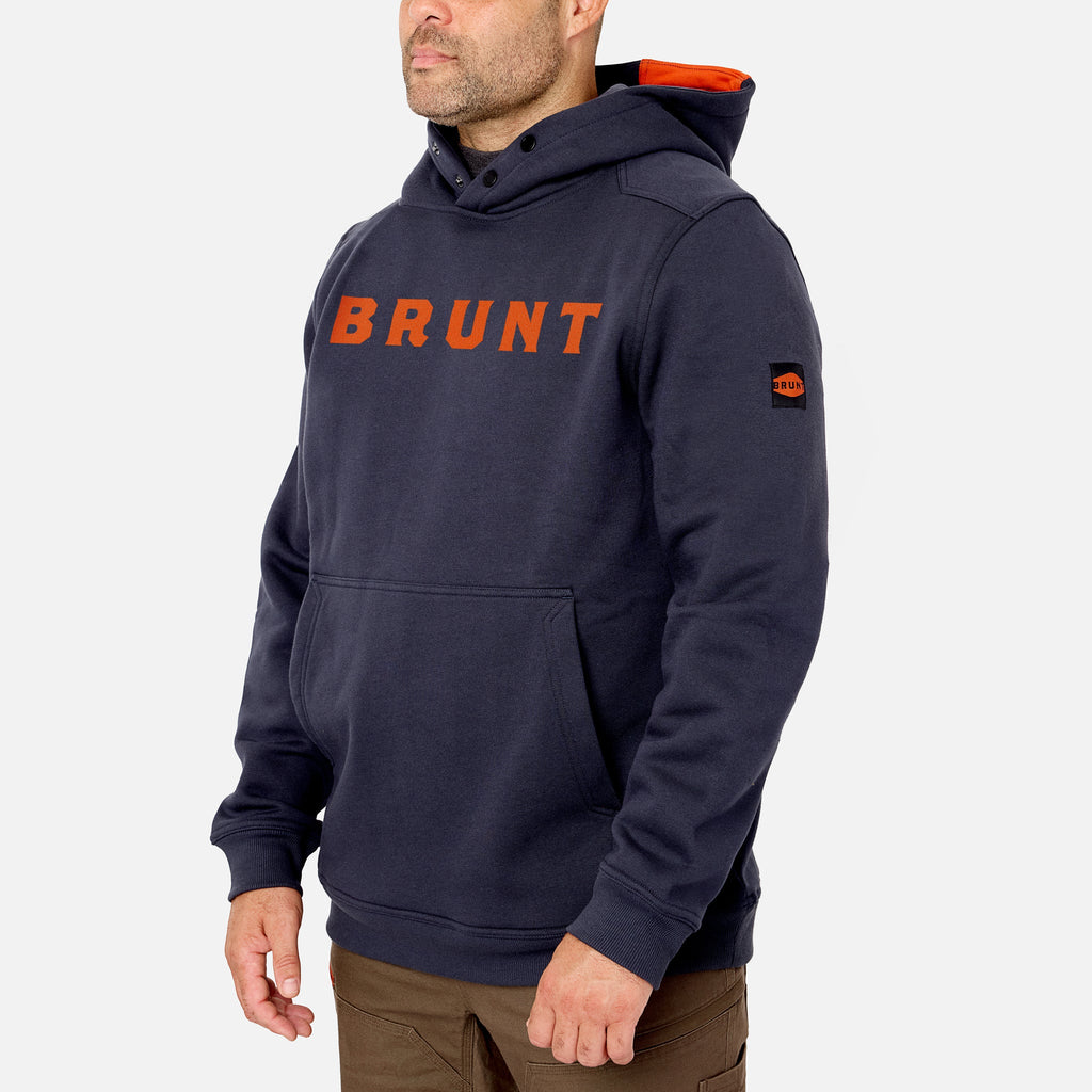45 degree angle of the front left side of the limited edition BRUNT water resistant shevlin work hoodie in navy with BRUNT on chest * 1