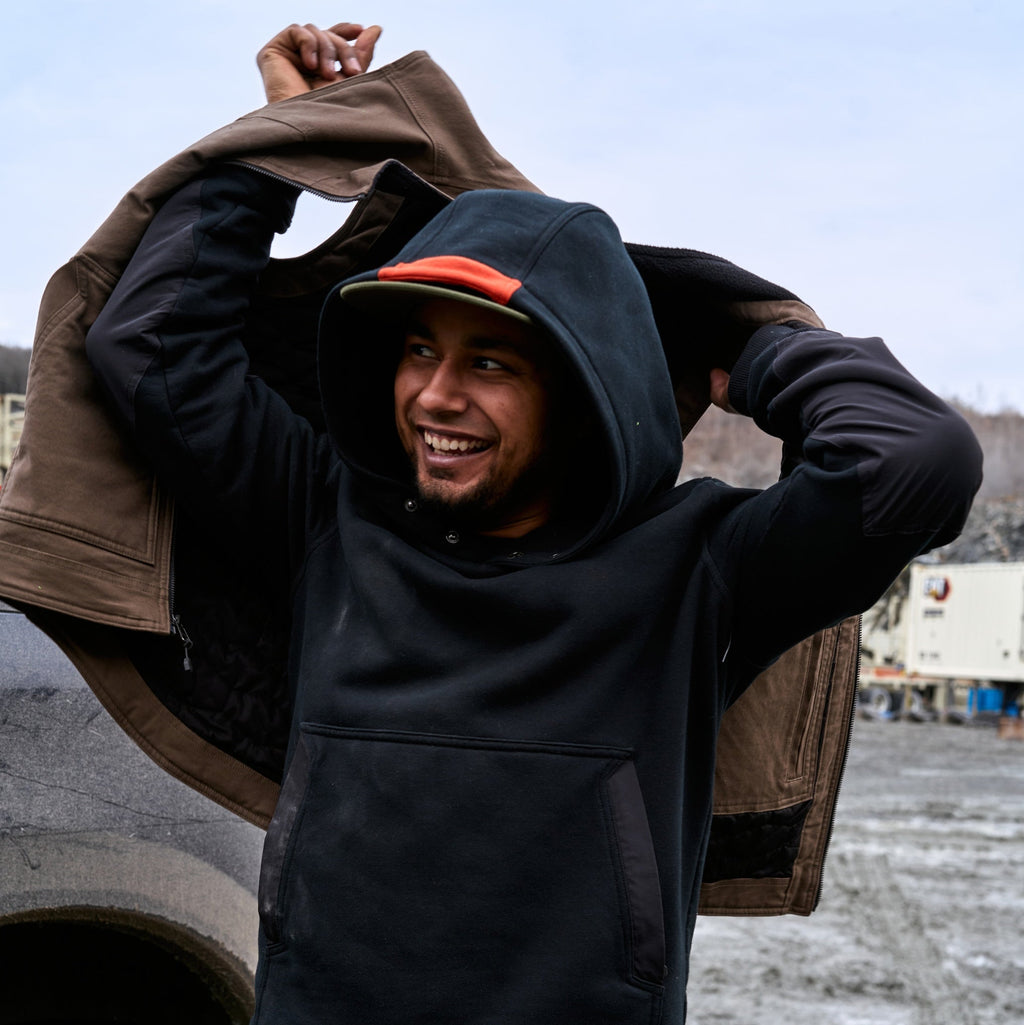 Man wearing BRUNT water resistant heavy duty shevlin work hoodie in black