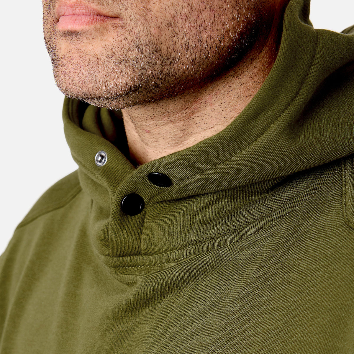 View 2 front of button snaps of the BRUNT water resistant shevlin work hoodie in hunter green