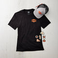 Black BRUNT t-shirt with black and grey BRUNT hat and BRUNT signature stickers