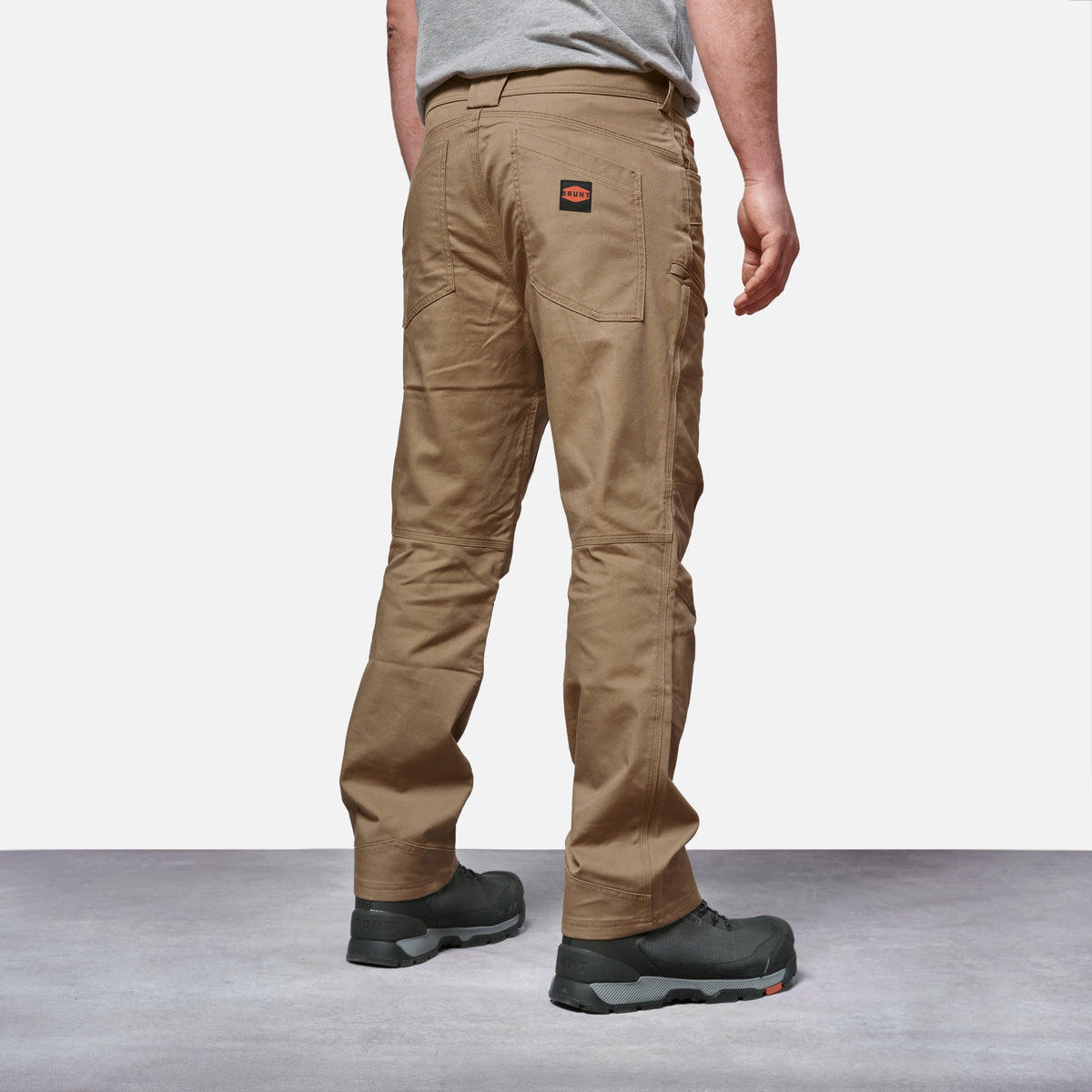 45 degree angle of back right side of BRUNT water resistant double-knee torra hd work pant in tan * 0
