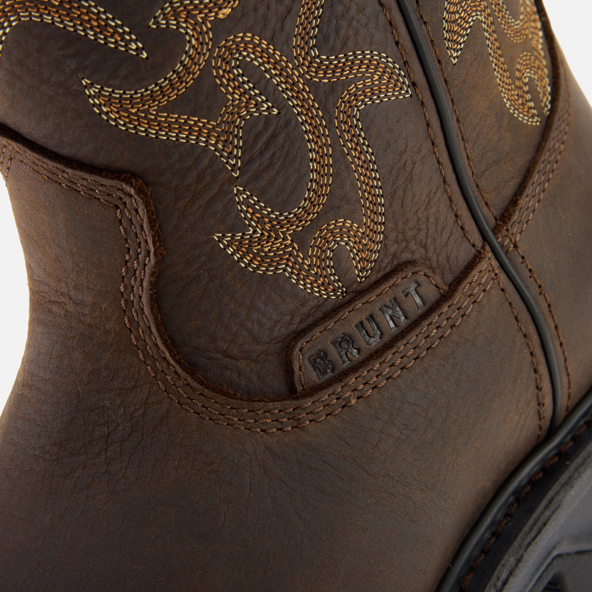Close up details of the BRUNT 10 inch welted waterproof composite square toe work boot in dark brown
