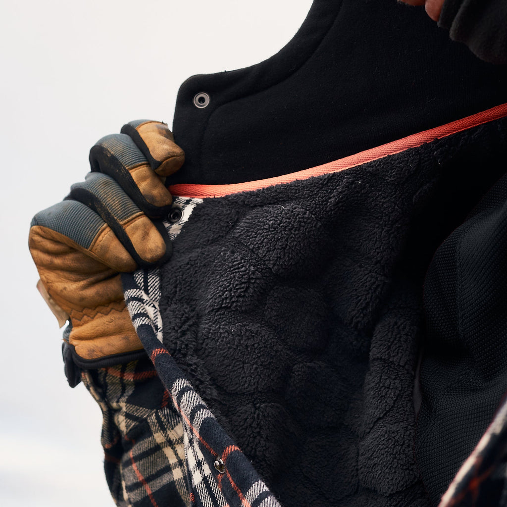 Inside insulation of the BRUNT quilted flannel work jacket in black orange plaid * 1
