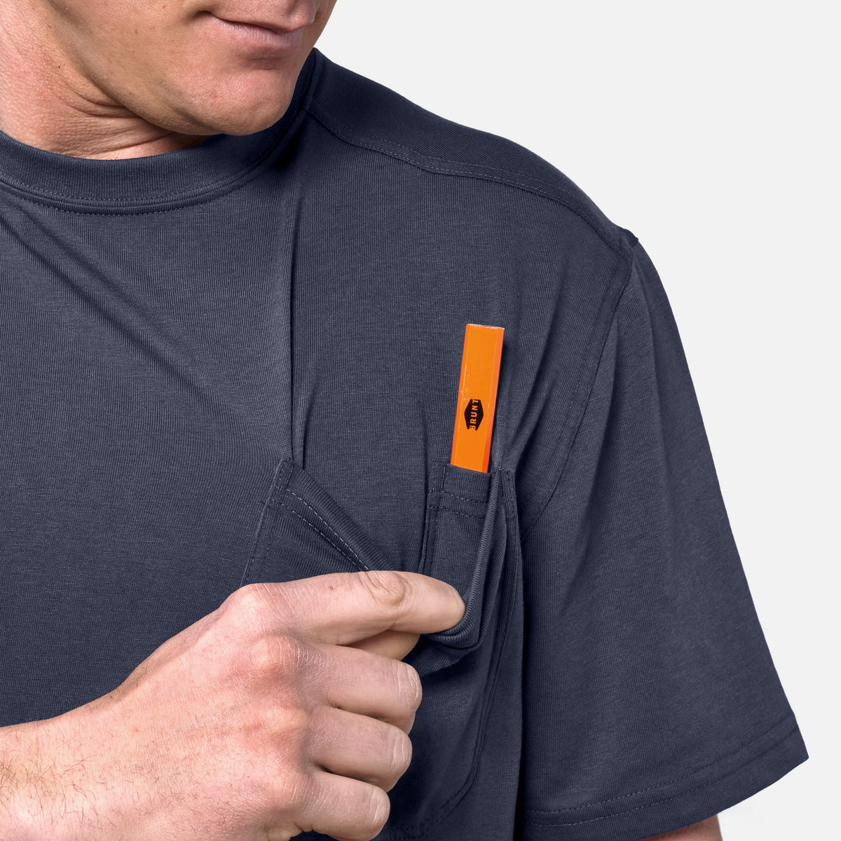 Front of chest pocket with pencil slot of the BRUNT high quality short sleeve pocket tee in navy blue